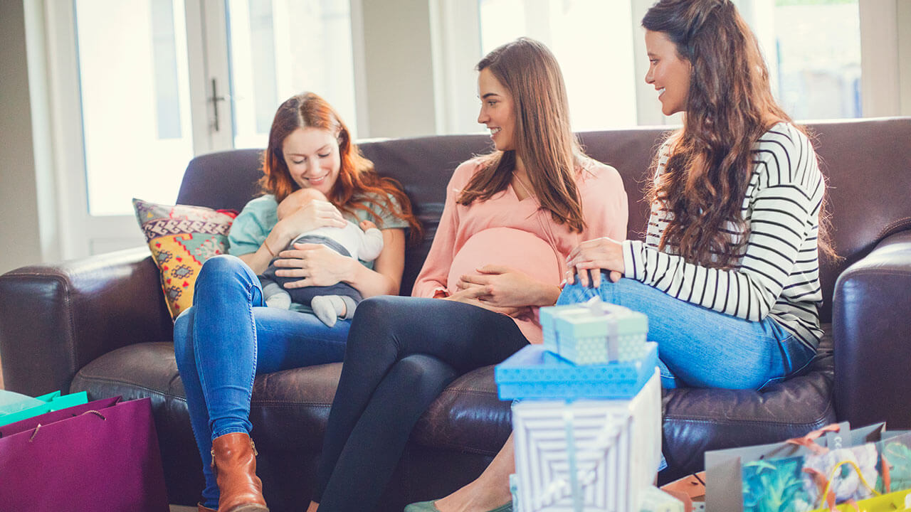 Pregnant women sitting together