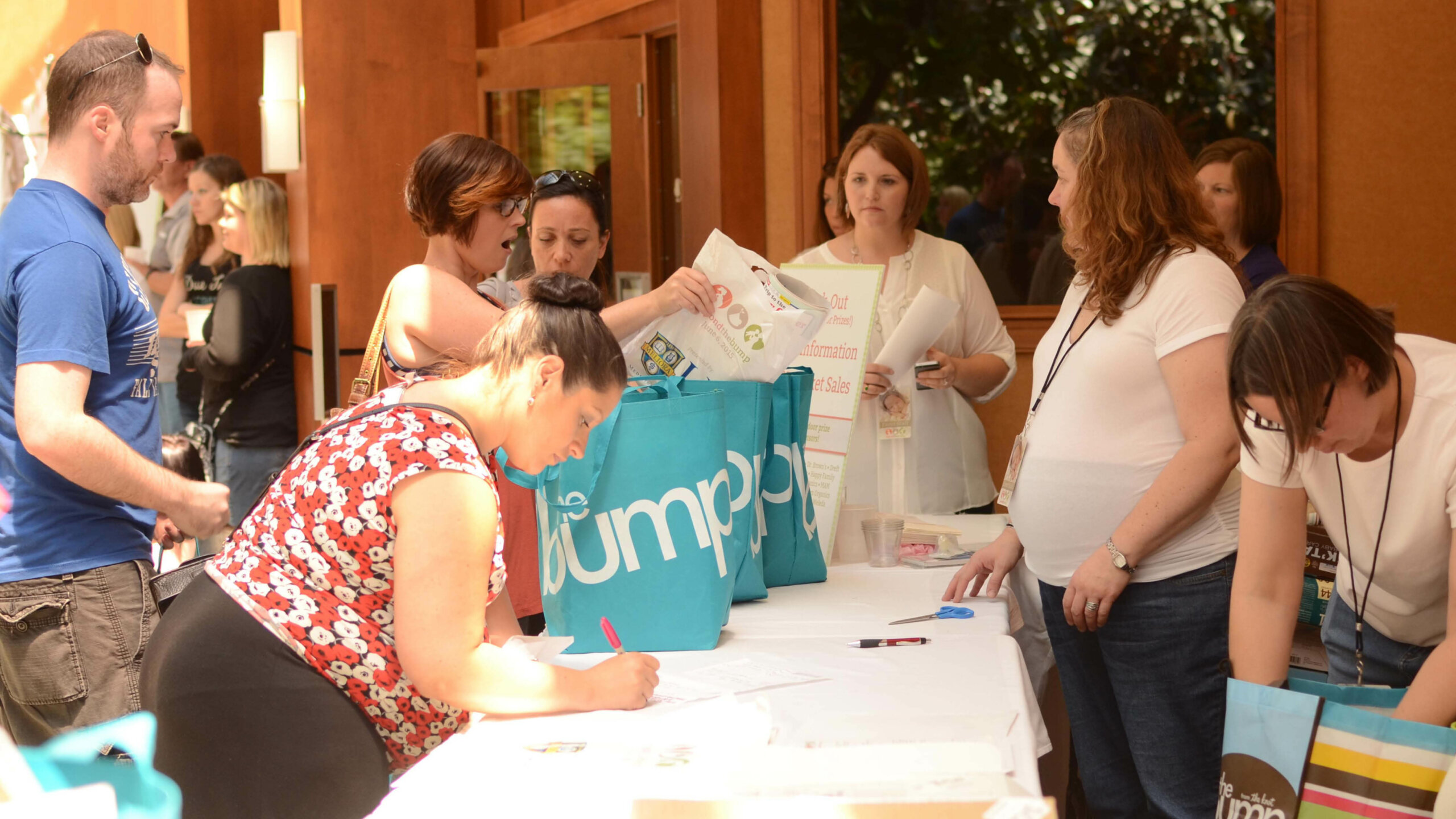staff and attendees at babies & bumps event