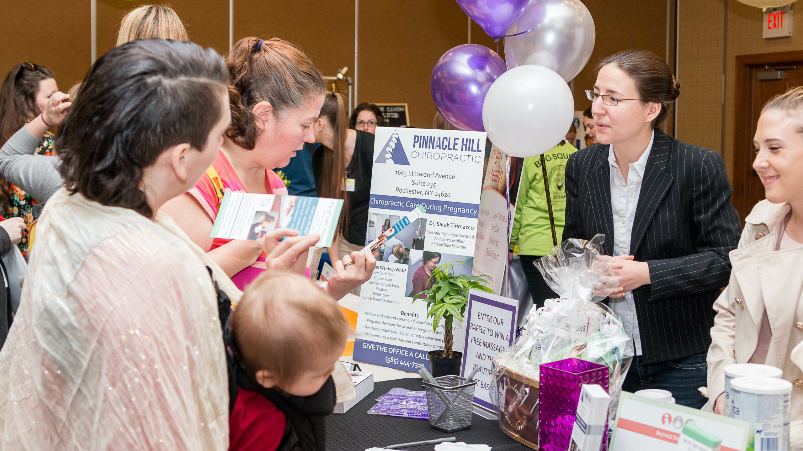 exhibitor and attendees at babies & bumps event