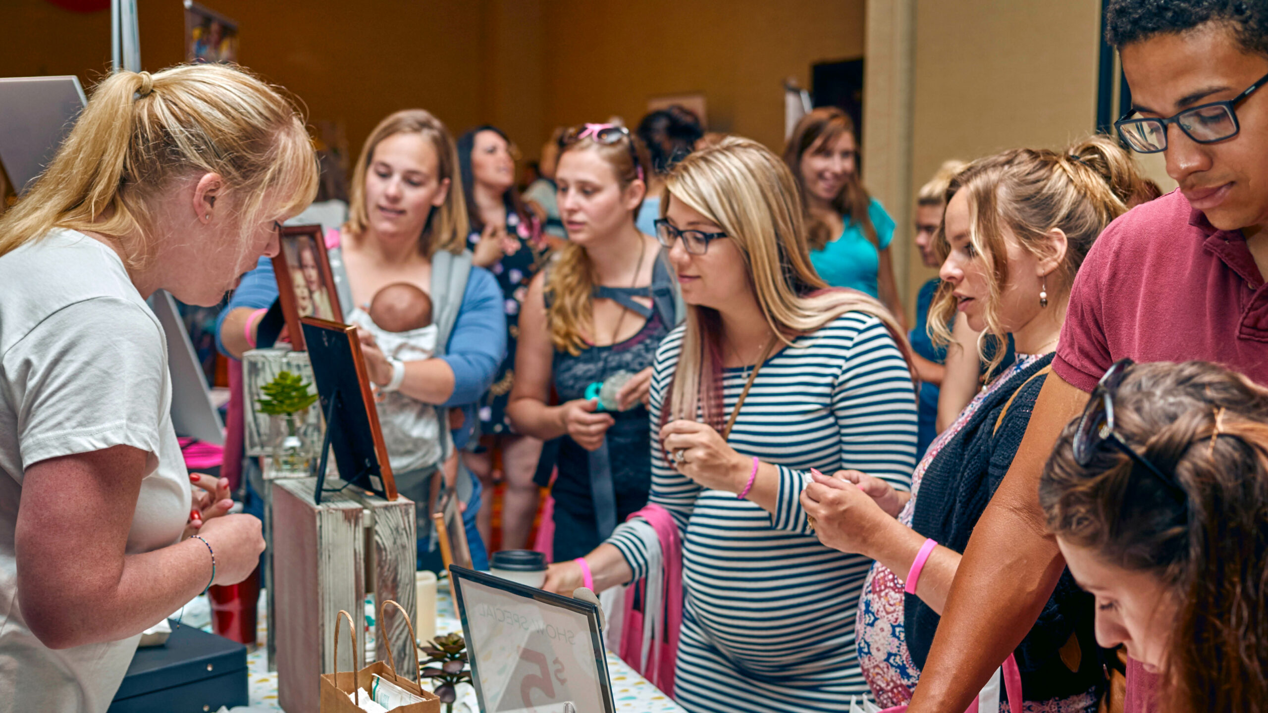 attendees with exhibitors at event